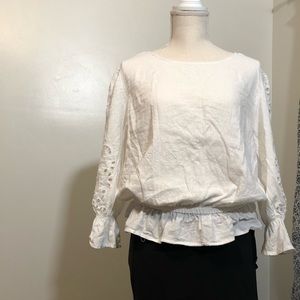 Dressy white blouse with peplum